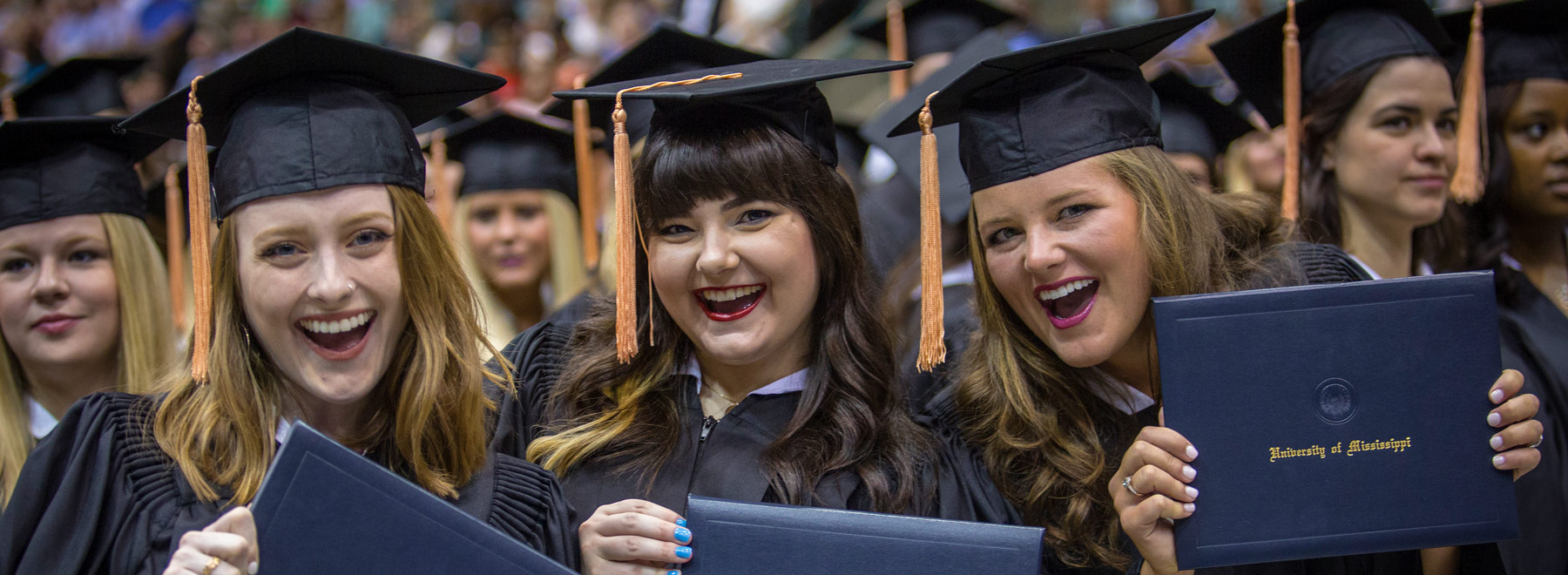 School of Nursing graduates show off their diplomas on commencement day