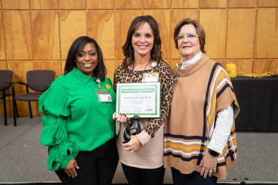 LeAnn Harcharik is presented with DAISY Nurse Leader Award