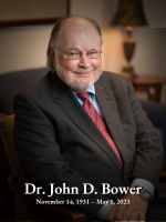 Portrait of Dr. John D. Bower with text that reads: Dr. John D. Bower, November 14, 1931 – May 1, 2023