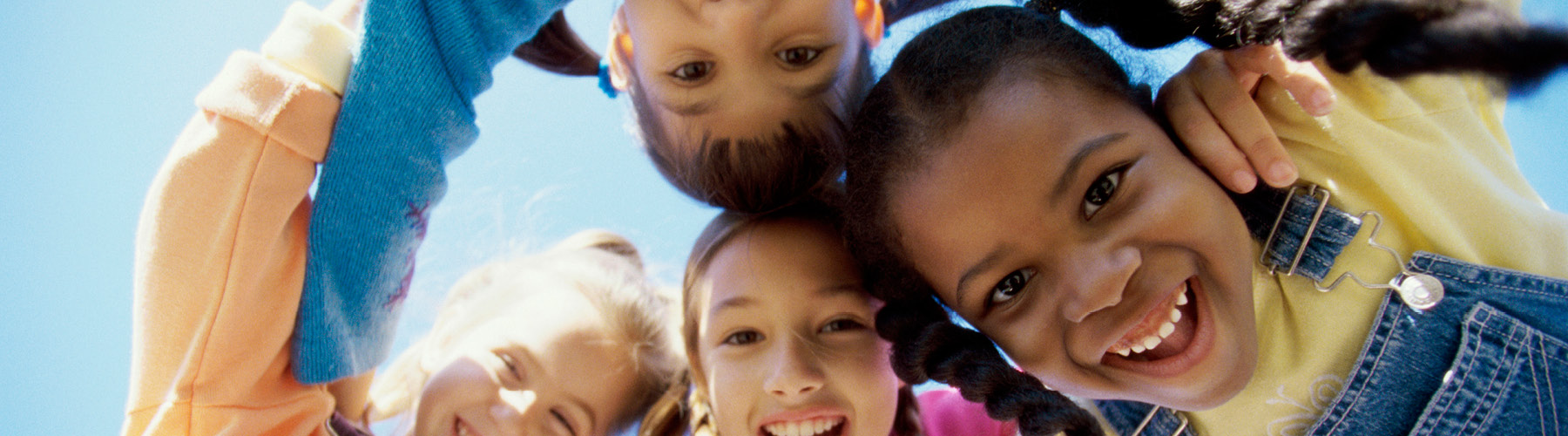 Group of children looking down