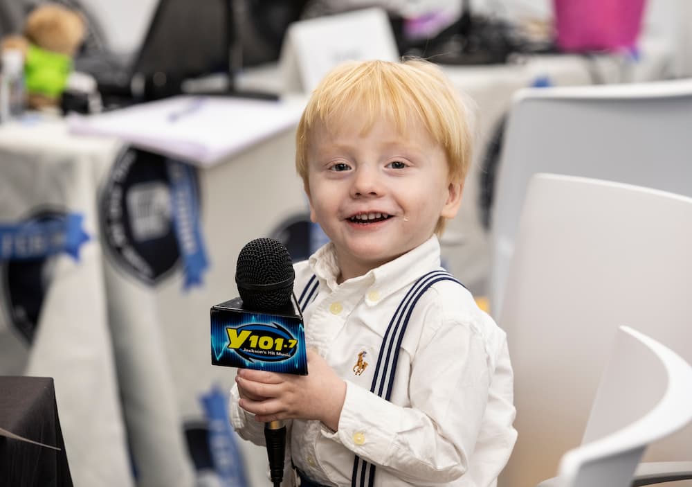 Children's of Mississippi patient Jackson Brister-McDaniel is ready for the radio.
