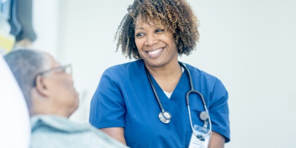 Provider smile while talking to patient.