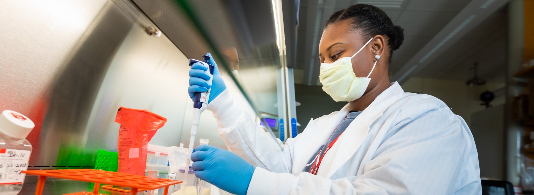 Diabetes project member conducts research in a lab.