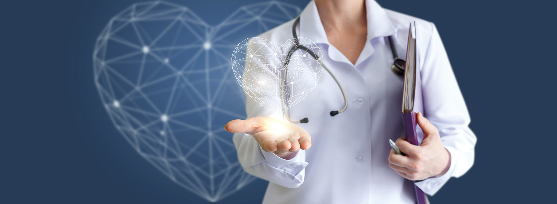 A female physician in a white coat with a stethoscope around her neck and holding a chart and a pen holds out in the palm of her hand an image of the heart that looks like a hologram. The same image is shown superimposed over a blue background.