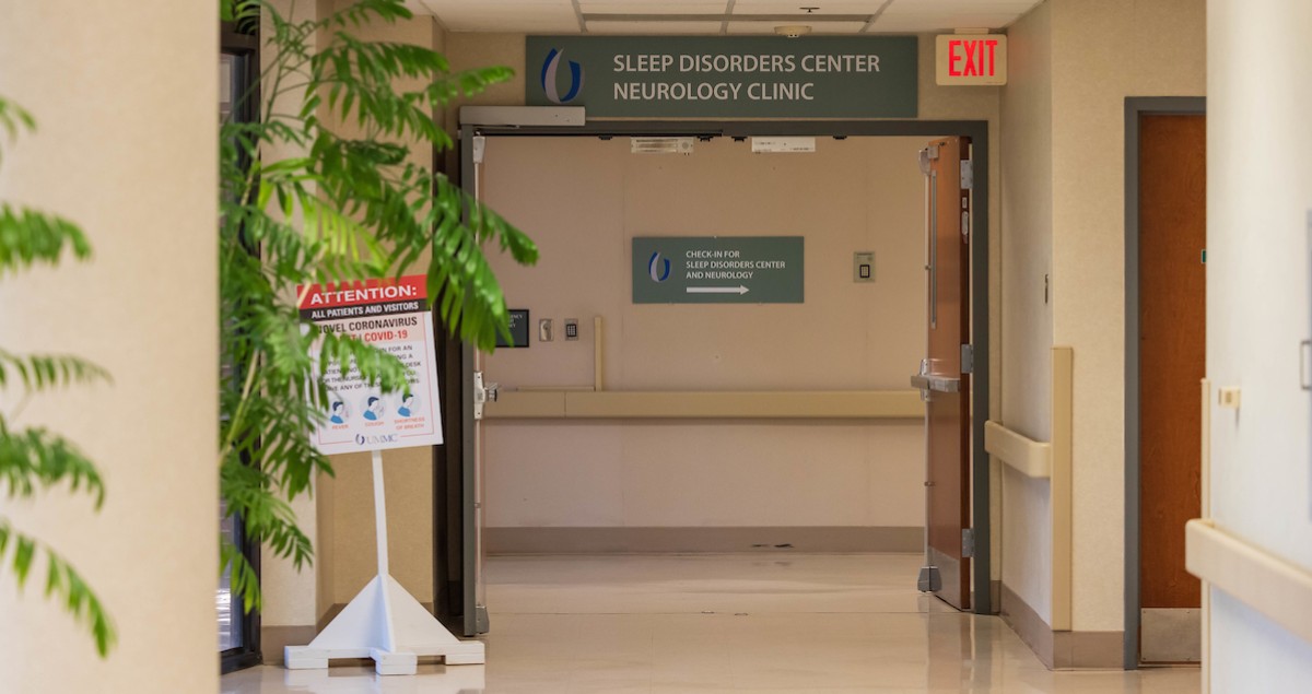 Doorway to UMMC Sleep Medicine Clinic with UMMC Sleep Medicine signage "Sleep Disorders Neurology" posted above entrance..