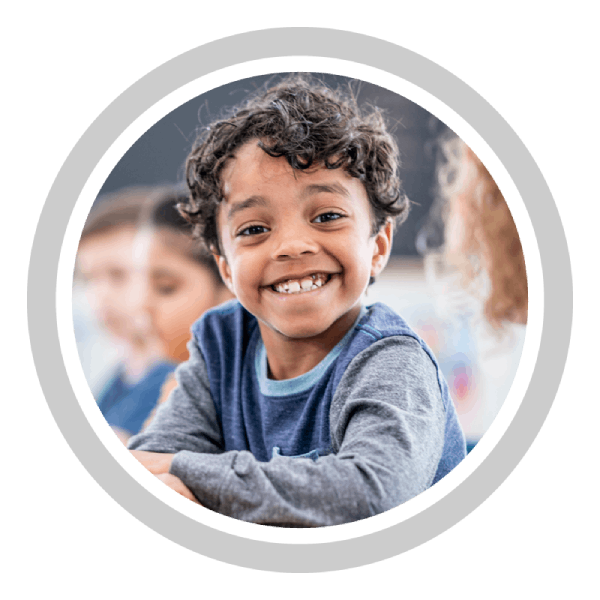 Young child smiling.