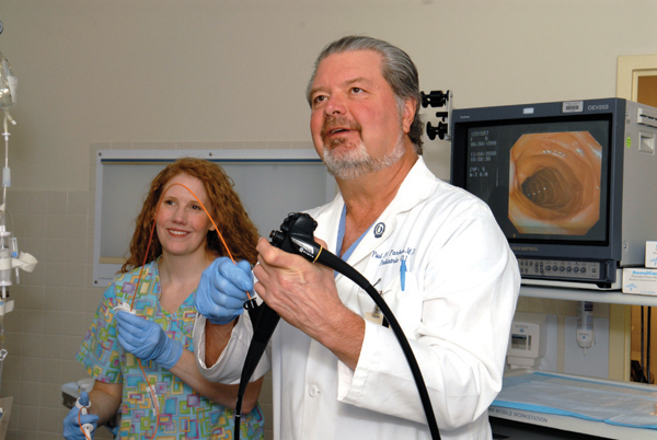 Parker and nurse Suzanne Deaton perform an endoscopy in 2008 at the gastroenterology lab at Batson Children's Hospital.