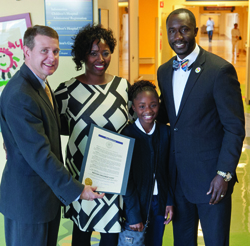 Children's of Mississippi CEO Guy Giesecke (left) accepts a proclamation declaring November 14 as Batson Children's Day from Jackson Mayor Tony Yarber, his wife Rosalind Yarber, and their daughter, Toni Michelle.