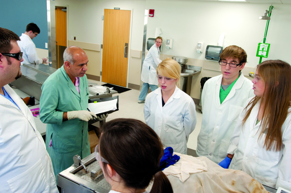 Dr. Adel Maklad (second from left) quizzes the students at Table 25: counterclockwise, from left, Brent Necaise, Kate Garner, Kim Zachow, Colton Lee and Rachel Sharp.