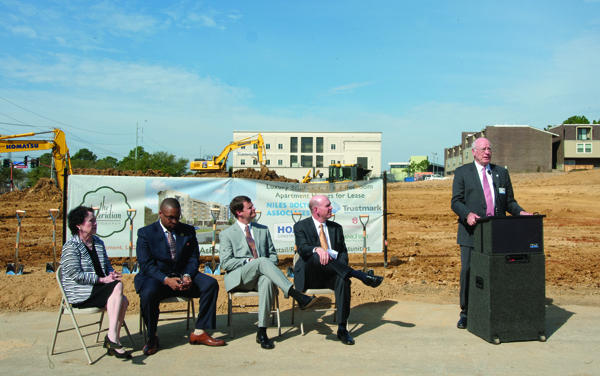 Former University of Mississippi Medical Center Vice Chancellor Dr. James Keeton, at podium, welcomes visitors to the groundbreaking ceremony for the Meridian, a $33 million apartment home development on Lakeland Drive across from the UMMC campus. Joining him are, from left, Jackson Ward 7 Councilwoman Margaret Barrett-Simon; Jason Goree, city of Jackson economic developer; John Ditto, a partner in the StateStreet Group; and Stewart Speed, a partner in SKD Development.