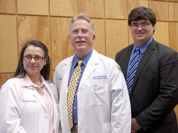 The Department of Medicine and Medical Student Research Program teamed up on March 31 to hold a joint Research Day. Pictured are Dr. Licy Yanes Cardozo, left, who won first place in the poster competition for DOM; Dr. Gailen Marshall, center, UMMC professor of medicine and pediatrics and DOM Vice Chair for Research; and Reed Gilbow, a third year medical student who won first place in the MSRP poster competition.