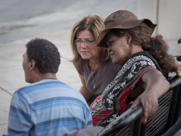 Irby, an empathetic listener, spends time with the homeless in Jackson's Smith Park.