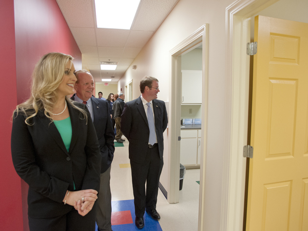 Julie Sparks, nurse coordinator at Children's of Mississippi's new Tupelo clinic, gives a tour of the facility to Chauncey Godwin (center), chair of the Tupelo Community Development Foundation; and Tupelo Mayor Jason Shelton.