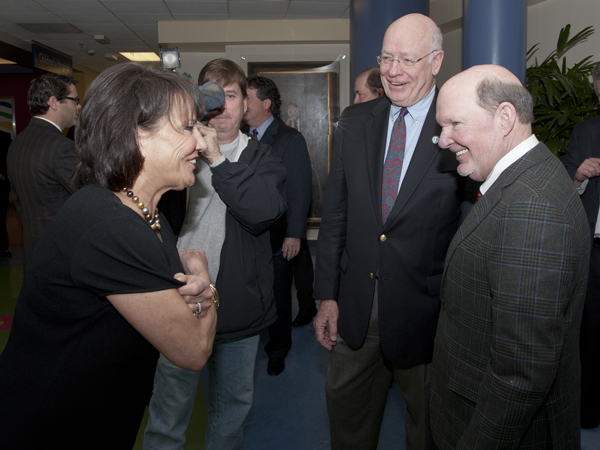 Sara Ray, left, board chair of FOCH, shares in the excitement of the $1.1M gift with Keeton, center, and Sanderson