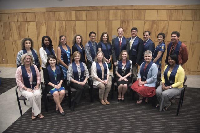 Nelson Order honorees include (front row, from left) Robin Parish, Kristi Moore, Cindy Luther, Mary McNair, Mary Stewart, Kate Fouquier, Felicia Tardy, and (back row, from left) Angela Morey, Meagan Brown, Lisa Didion, Lique Coolen, Jordan Lu, Elizabeth Lutz, Bill Daley, Stephen Stray, Jose Subauste, Susan Warren and Michael Hebert.  Not pictured: Jennifer Bain.