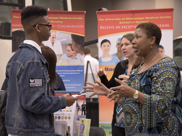Murrah student Jarvis Banks talks with Dr. Marilyn Harrington about a career in nursing.
