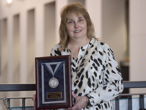 Alexander with her 2015 Platinum Award