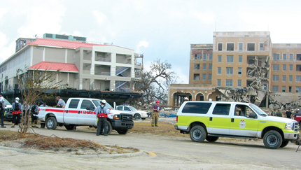 Katrina search and rescue vehicles park outside a damaged casino on the Mississippi Gulf Coast.