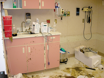 Mud and debris coat the interior of the Hancock County Medical Center in Bay St. Louis.