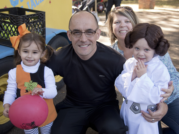 Sybil Cumberland, right, and mom Tara Cumberland of Brandon have some Halloween fun at the home of Children's Heart Center medical director Dr. Jorge Salazar during the center's family reunion in October. At left is Salazar's daughter, Lana.