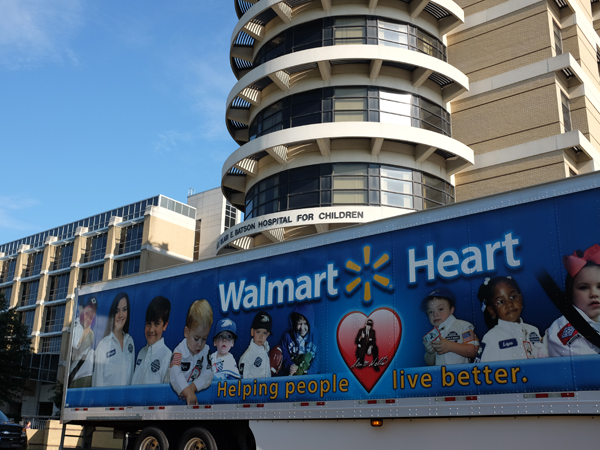 The Walmart truck Morgan rode to Clinton in tells the story of the company's commitment to pediatric care.