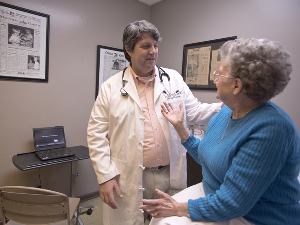 As with many physicians, Lampton says that spending time with patients like Tommie Beck of Magnolia is where he finds joy in the practice of medicine.