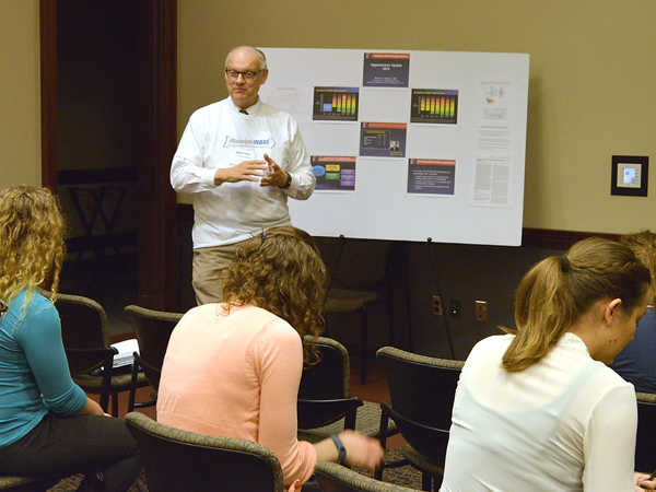 Dr. George Moll explains the basics of blood pressure to students at the Mississippi Academy of Sciences population health workshop.