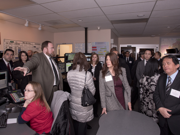 Jonathan Wilson, chief administrative officer, explains to the visiting consuls general the role of Mississippi MED-COM in the event that there is a natural disaster in the state.