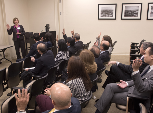 Dr. LouAnn Woodward asks for a show of hands for those visiting Mississippi for the first time.