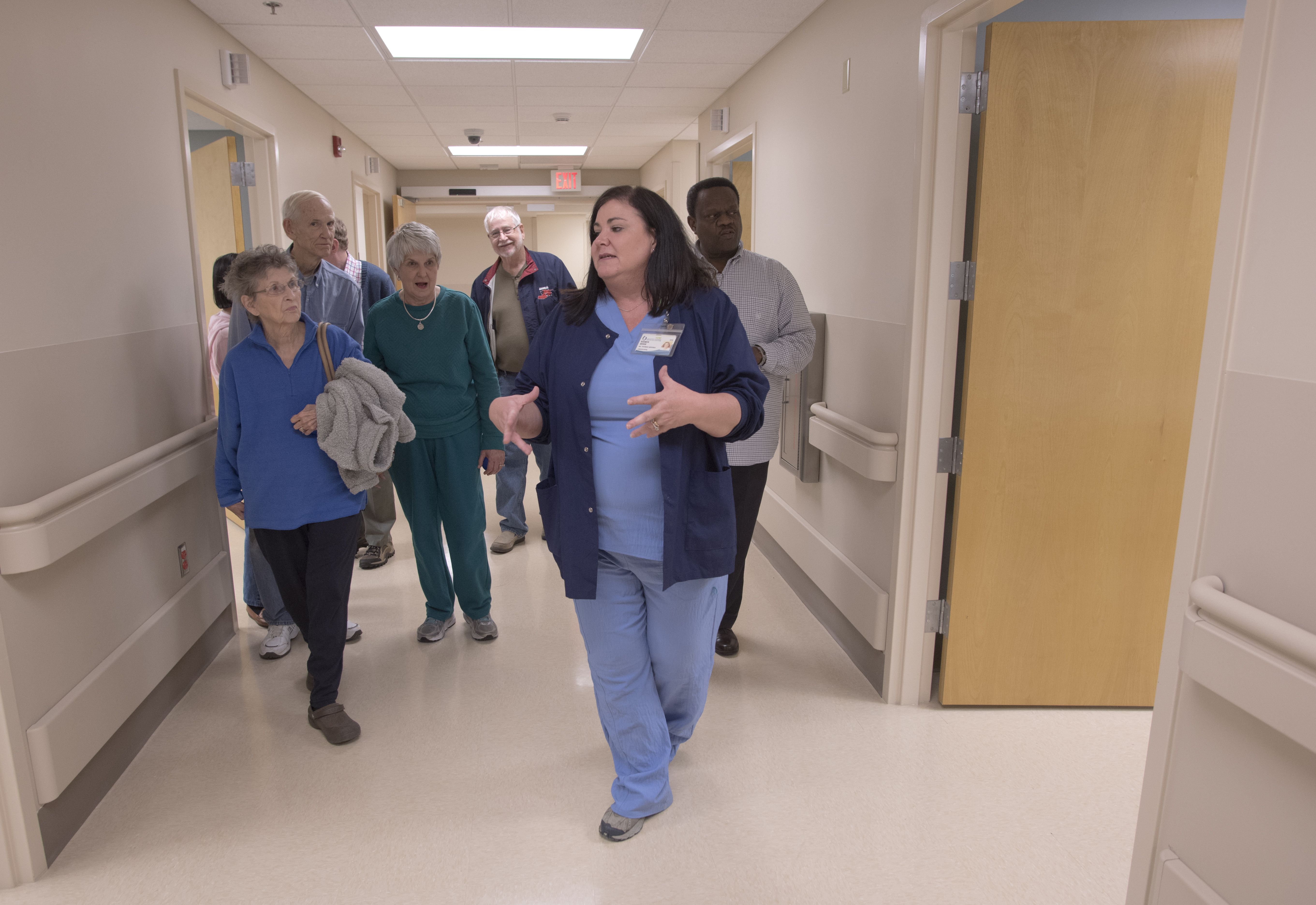 Elizabeth Adcock, manager of performance improvement at UMMC Holmes County, shows off the Lexington hospital's new Emergency Department to a crowd of local residents during a Jan. 15 open house.