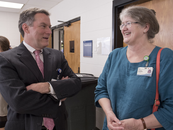 Barr and Schlessinger take a break during orientation day, June 29, for new residents.