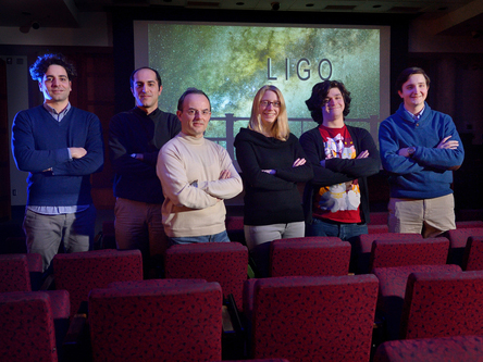 Dooley, third from right, with fellow LIGO team members.