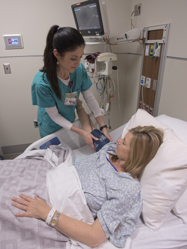 MMC nurse Stephanie Wagner preps Hall for a surgical procedure.