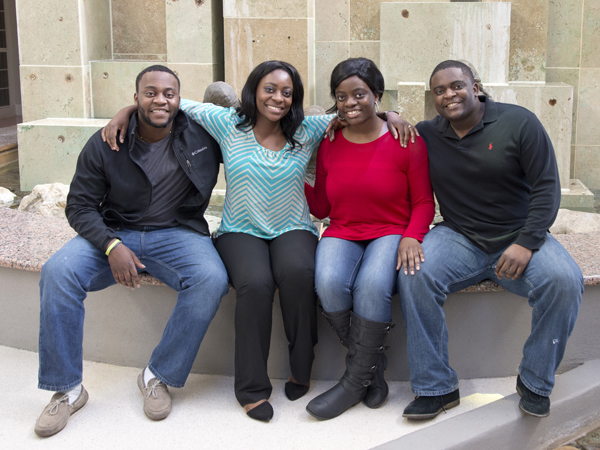 The Adah offspring are, from left, Esosa "Sosa" Adah, Dr. Ameze Adah, Osasu Adah and Omonuwa Adah.