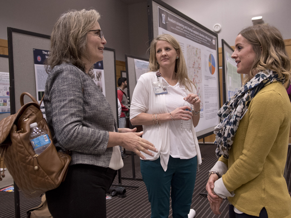   Kathy Knight, left, associate professor of nutrition and hospitality management at UM, Jennifer Cook, center, nurse practitioner at UMMC and Leslie Berryhill, clinical metabolic dietitian at UMMC. Berryhill and Cook presented a poster on newborn screening and inherited metabolic disorders in Mississippi. Knight presented on nutritional interventions to prevent childhood obesity.