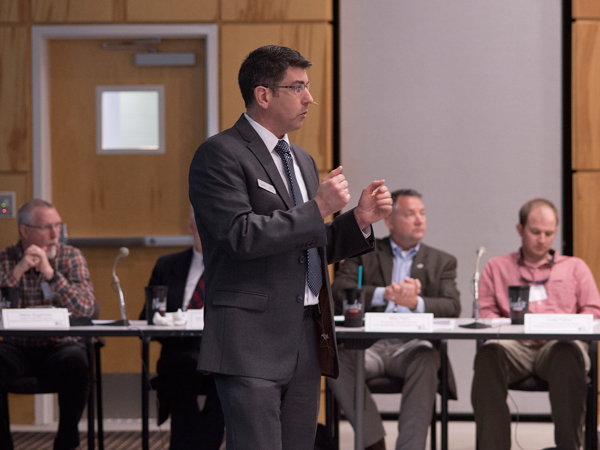 Mark Strauss, exercise planner with Summit Exercises and Training in Washington, D.C., moderates a discussion.