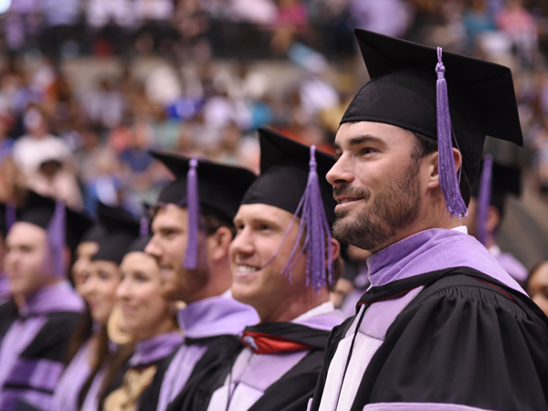 Graduates of the UMMC School of Dentistry prepare to accept their diplomas.