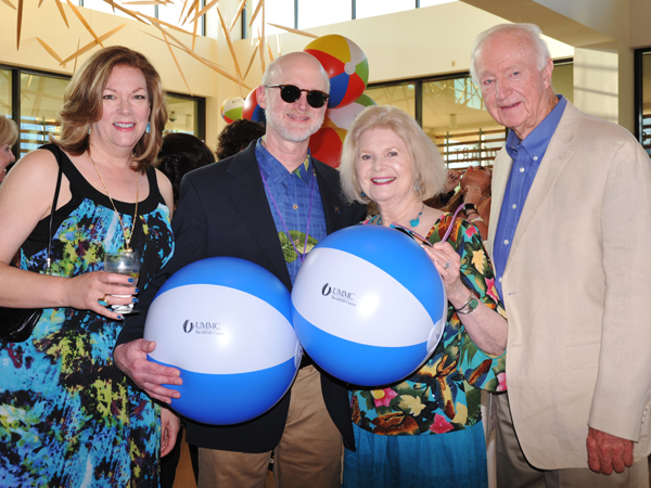 Enjoying The Mind Center's Catch a Wave Sponsor Reception are, from left, Emily and Dr. Tom Mosley and his parents, Mattie and Tommy Mosley.