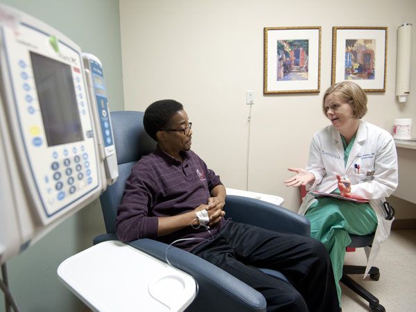 Delaski, a nurse practitioner at the sickle cell clinic held Mondays in the Jackson Medical Mall, is the regular caregiver for patient Jimmie Lacey of Brandon.