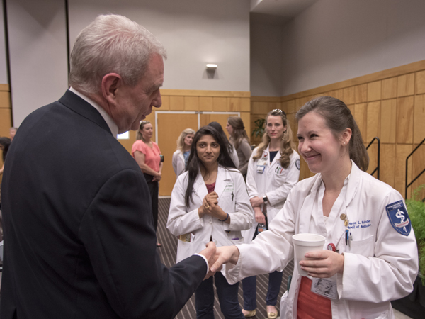 Lauren Schober, M3, meets with Jones after the Last Lecture.