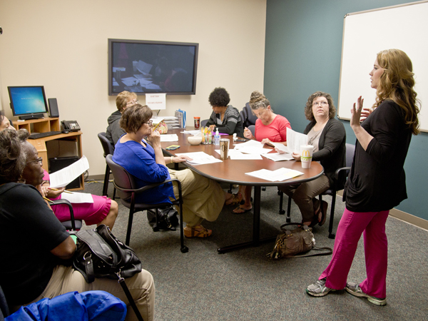 The actresses meet with Paula Rutledge, right, program administrator at the Clinical Skills Assessment Lab at the Jackson Medical Mall, before assuming the persona of the standardized patient, Jane Doe, for the students.