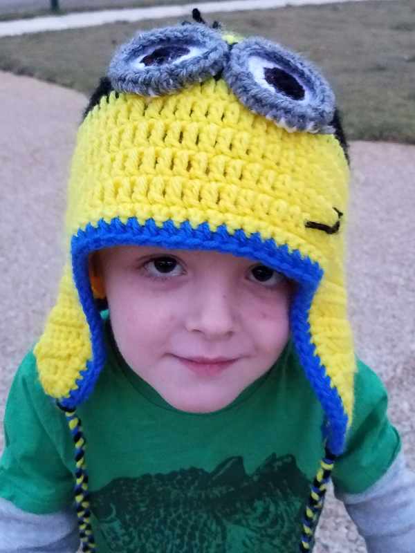 Colt Fulton, son of DIS employee Eli Fulton, wears a Minion hat crafted by Jackie Robinson.