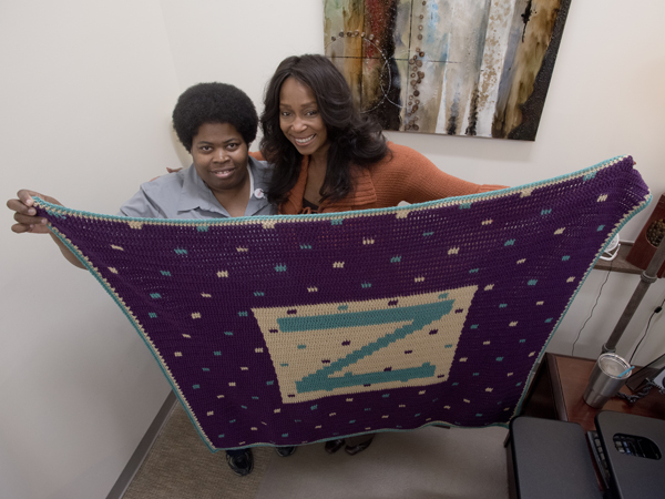 Robinson crocheted a personalized throw for Zonzie McLaurin
