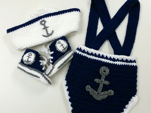 Robinson created a baby's anchor-themed sailor suit complete with hat and booties.