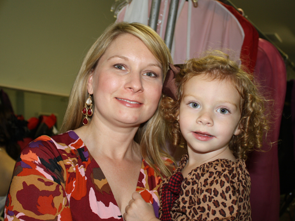 Dr. Nikki Shoemake-Patterson and daughter Grace visit backstage together during a November 2012 beauty review in Vicksburg featuring stepdaughter Morgan Patterson.