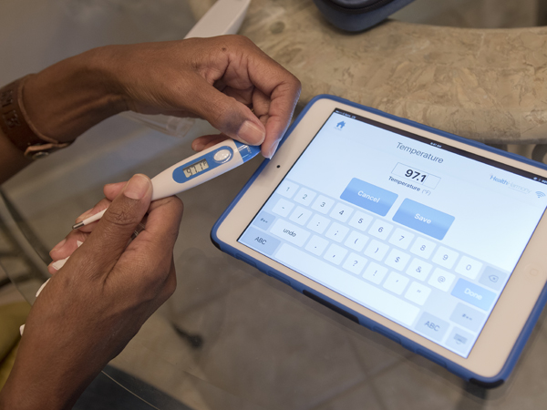 The thermometer, glucose monitor and blood pressure cuff communicate with the iPad Mini by Bluetooth and do not need to be plugged in.