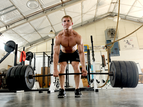 Davis dead-lifts 405 pounds during a July workout while preparing for the Team USA Military competition. (Mississippi National Guard photo by Staff Sgt. Michael Williams, Joint Force Headquarters-Mississippi Public Affairs Office)