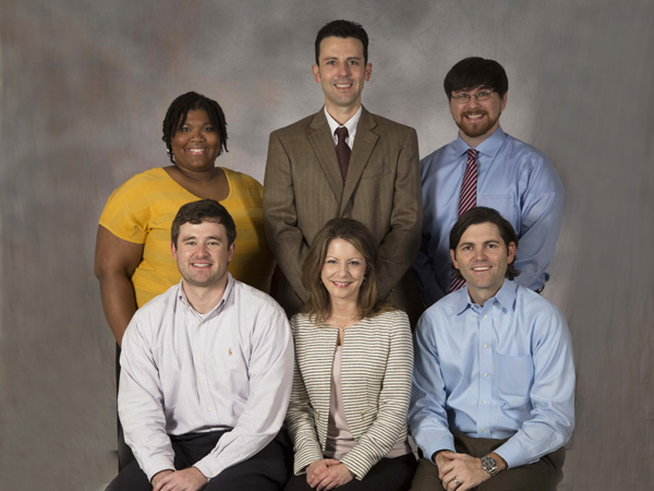 Staff members of the Psychiatry Outreach Program are, front row, from left, row, co-founders Dr. Matthew Walker, a third-year resident; Dr. Chasity Torrence, assistant professor of psychiatry; and fourth-year resident Dr. Charles "Chaz" Richardson; back row, from left, volunteers Yolonda Ross, a fourth-year medical student; Dr. Jon Jackson, assistant professor of psychiatry; and Jonathan Baker, a fourth-year medical student.