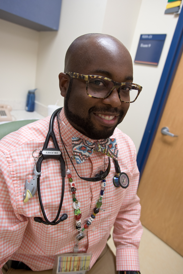 Josey wears his Beads of Courage as a lanyard for his employee ID card.