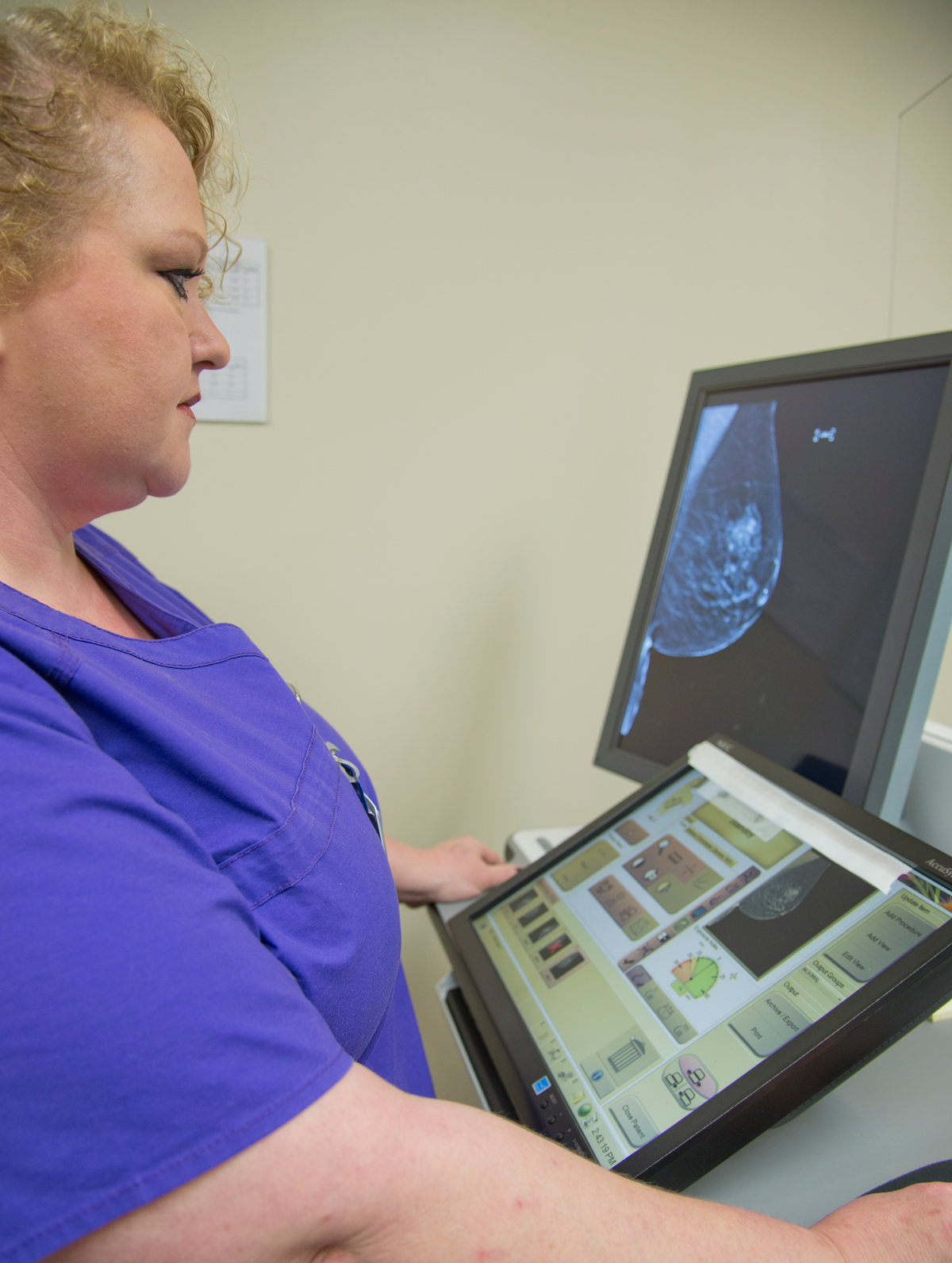McCammon examines a mammography scan.